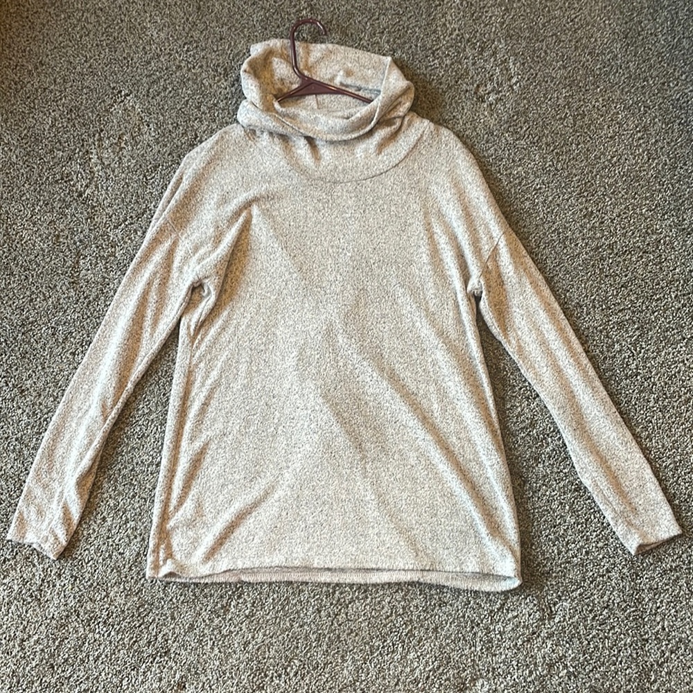 Women’s grey long sleeve turtleneck. Open crisscross back. Size small women’s.